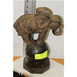 ELEPHANT STANDING ON WORLD ORNAMENT