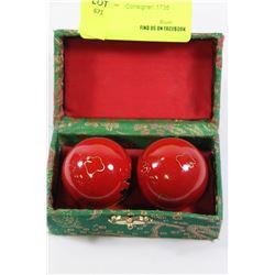 PAIR OF RED ENAMEL CHINESE HEALING BALLS