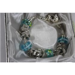 CHARM BRACELET W/ SILVER GLASS CHARMS