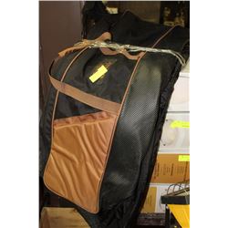 TWO TRAVEL GOLF BAGS - TAYLOR MADE AND JOHN