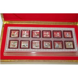 12 COIN YEAR OF THE RABBIT COIN SET IN WOOD CASE