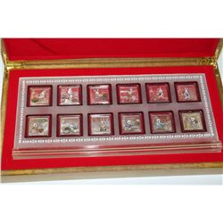12 COIN YEAR OF THE RABBIT COIN SET IN WOOD CASE
