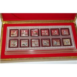 12 COIN YEAR OF THE RABBIT COIN SET IN WOOD CASE