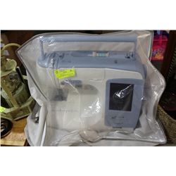 KENMORE ERGO 3 SEWING/ EMBROIDERING MACHINE COMES