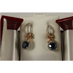 PAIR OF 14 KT WHITE AND ROSE GOLD BLUE DIAMOND