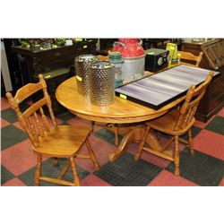 SOLID OAK TABLE W 2 LEAVES AND 4 CHAIRS