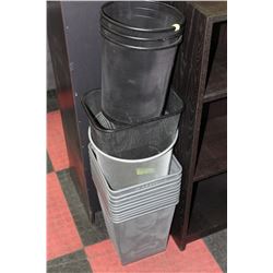 STACK OF METAL GARBAGE CANS
