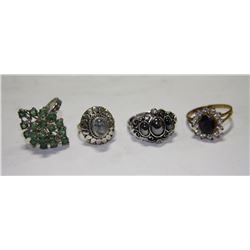 LOT OF 4 RINGS - SIZES UNKNOWN