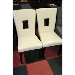 PAIR OF WHITE LEATHERETTE SIDECHAIRS