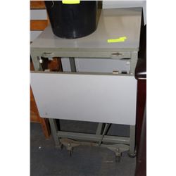 SMALL TABLE WITH FLIP UP LEAF ON WHEELS