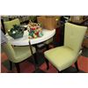 Image 1 : WHITE TABLE WITH 4 LIGHT GREEN FABRIC CHAIRS