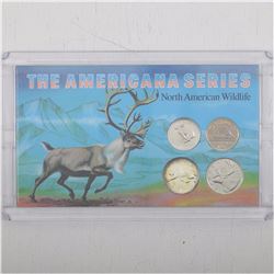 The North Americanada Series Wildlife 4-coin Set in hard plastic holder with information card.