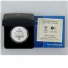 Image 1 : 2010 The Sun Olympic $1 Commemorative Coin issued by the Royal Canadian Mint (coin is lightly toned)