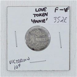 Love Token made from a Victorian 10-cent with "Annie" engraved into it.