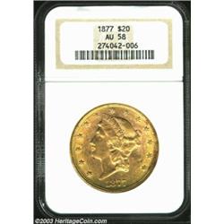 1877 $20 AU58 NGC. A bright and lustrous Double Eagle that has a few luster grazes in the fields. Th