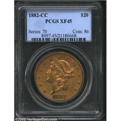 1882-CC $20 XF45 PCGS. This honey-gold survivor is lightly worn, yet free of an excessive number of.