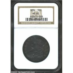 1834 50C Large Date, Large Letters MS62 NGC. O-103, R.2. The centers have deep aqua-marine patina, w