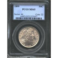 1899 50C MS65 PCGS. Bright cartwheel luster is tempered by a few blushes of golden patina on the obv