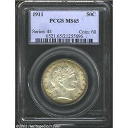 1911 50C MS65 PCGS. A shimmering, naturally patinated Gem that is attractively framed in olive and o