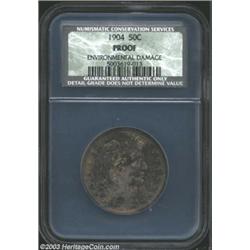 1904 50C Proof, Environmental Damage, NCS. Orange, violet, and apricot colors emerge when the coin i