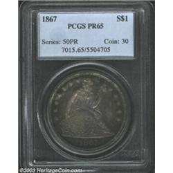 1867 S$1 PR65 PCGS. A magnificently toned Gem specimen that displays speckled violet hues across the