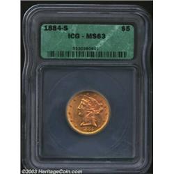 1884-S $5 MS63 ICG. Clean and generally mark-free, the lustrous surfaces have acquired a golden-rose