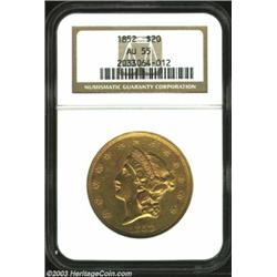 1852 $20 AU55 NGC. Nicely mark-free surfaces are covered in a blanket of rich, rose-gold color. The.
