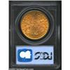 Image 2 : 1898 $20 MS61 PCGS. Orange-gold and green-gold colors compete for dominance as the surfaces rotate u