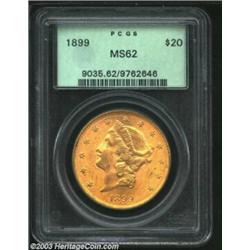 1899 $20 MS62 PCGS. Extremely close to Choice with thick, satiny luster, rich color, and no individu