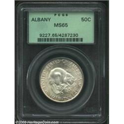 1936 50C Albany MS65 PCGS. The borders have light apricot and yellow-green patina. An exquisitely st