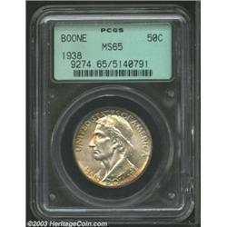 1938 50C Boone MS65 PCGS. Both sides are tinged in orange-gold peripheral color. The centers are mos