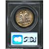 Image 2 : 1938-D 50C Boone MS67 PCGS. There is a patchwork of mottled colors on both sides that include orange