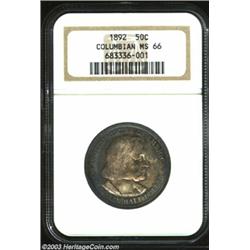 1892 50C Columbian MS66 NGC. Rich, original, cobalt-blue and antique-copper toning envelops the obve