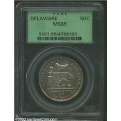 1936 50C Delaware MS65 PCGS. This coin appears to have spent a few years in an original cardboard ho