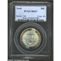 1936 50C York MS67 PCGS. The obverse is tab toned in olive, orange, and lavender hues. On the other.
