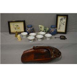 A selection of collectible including six Sake cups, a pair of Cloisonn‚ lidded jars, carved bone Ori