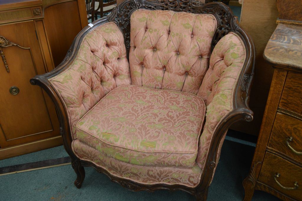 Queen Anne style button tufted full size sofa and chair with heavily carved show wood and supports
