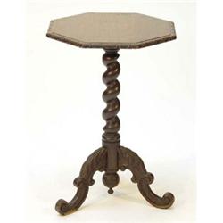 Octagonal carved oak occasional table on barleytwist support and tripod base…