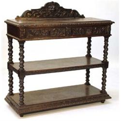 Carved oak three tier buffet with lion mask carved back rail and drawers on barleytwist supports…