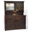 Image 1 : Carved oak sideboard, the super structure with bevelled mirror and a leaded glazed door, the lowe…