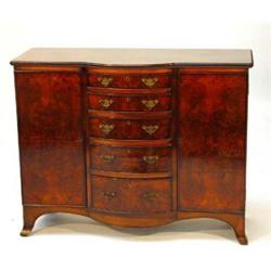 Burr walnut sideboard, the cross banded top above five centre bow fronted cockbeaded drawers flan…