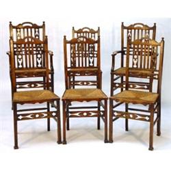 Set of six Arts & Crafts oak chairs with rush seats (to include two carvers)…