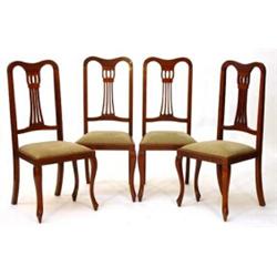 Set of four Edwardian mahogany framed dining chairs with upholstered drop in seats on cabriole le…