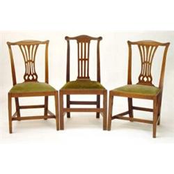 Pair of mahogany framed dining chairs with pierced splats and upholstered drop in seats and one o…