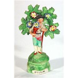 Early 19th century hand painted Staffordshire figure with floral brocage 'Gardners', 15cm high…