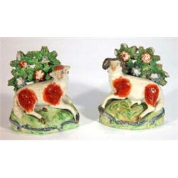 Pair of early 19th century hand painted Staffordshire ewe and ram with floral brocage, 11cm high…