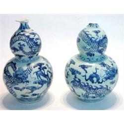 Pair of Chinese double Gourd vases, hand painted with blue and white dragons and flowers, 45cm hi…