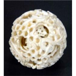 Carved ivory puzzle sphere…