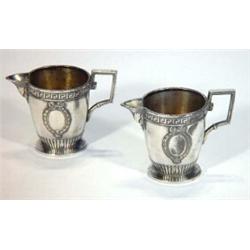 Small pair of silver plated WMF jugs with Greek key design, decorated with swags, marks to handle…