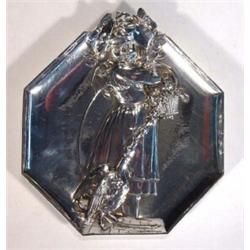 Hexagonal WMF style silver plated dish with a young child and basket of flowers fighting off a go…